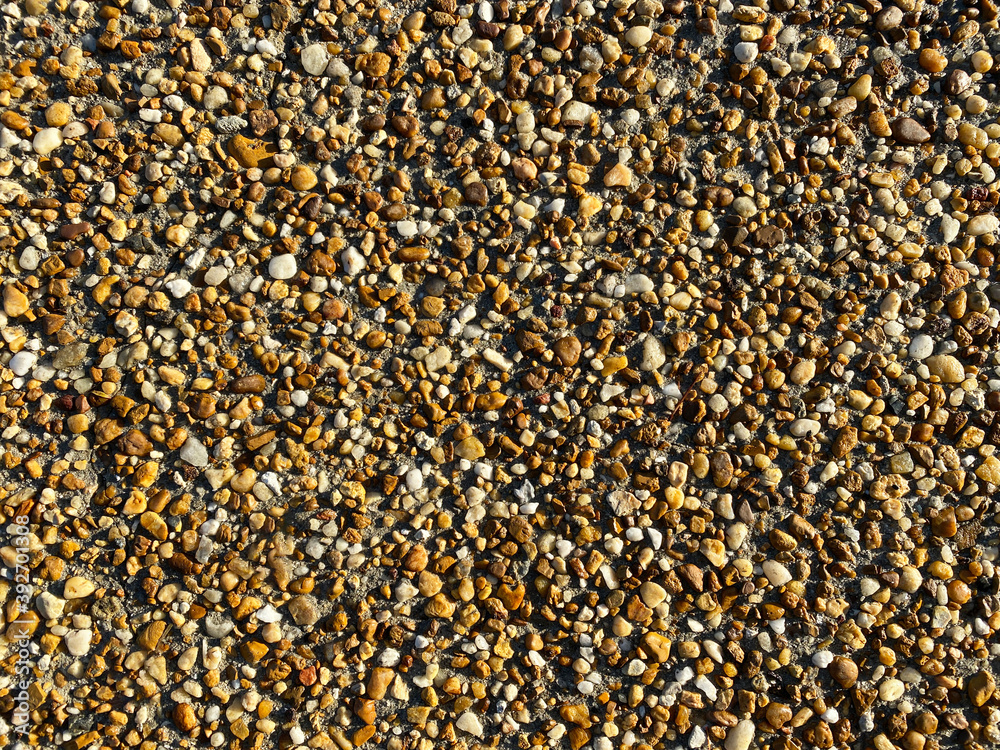 tan sandy beach stone pepple rocks overhead view with deep shadows and bright details as backdrop background for website architecture presentation scenery tan sandy beach stone pepple rocks overhead view with deep shadows and bright details as backdrop background for website architecture presentation scenery