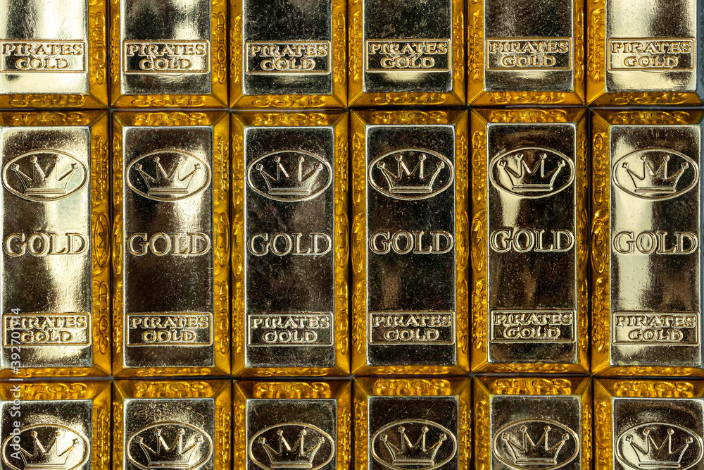 Top view of shiny gold bars stacked up in rows. Gold Bars 1000 grams. Concept of success in business and finance.