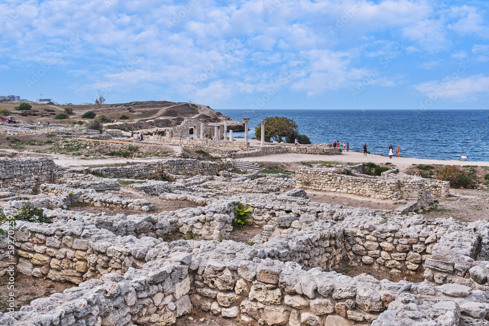 The ruins of the Chersonesos Taurica, Sevastopol, Crimean Peninsula, Russia. Tourists visiting the sights.
