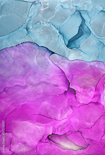Alcohol ink art.Mixing liquid paints. Modern, abstract colorful background, wallpaper. Marble texture.Translucent colors