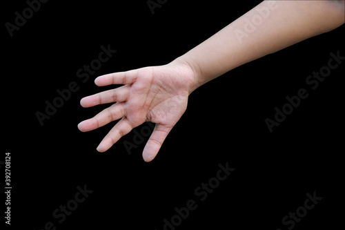 hands of the child isolated on black background