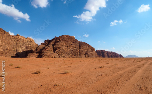Desert rock mountain  red sand and blue sky