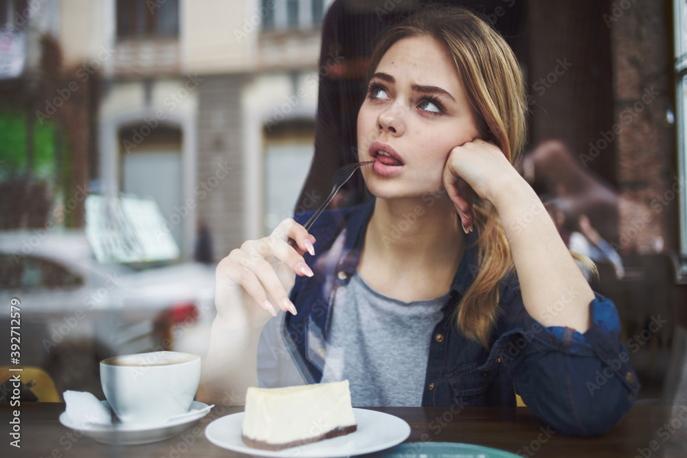 Pretty woman in cafe eating vacation lifestyle Pretty woman in cafe eating vacation lifestyle