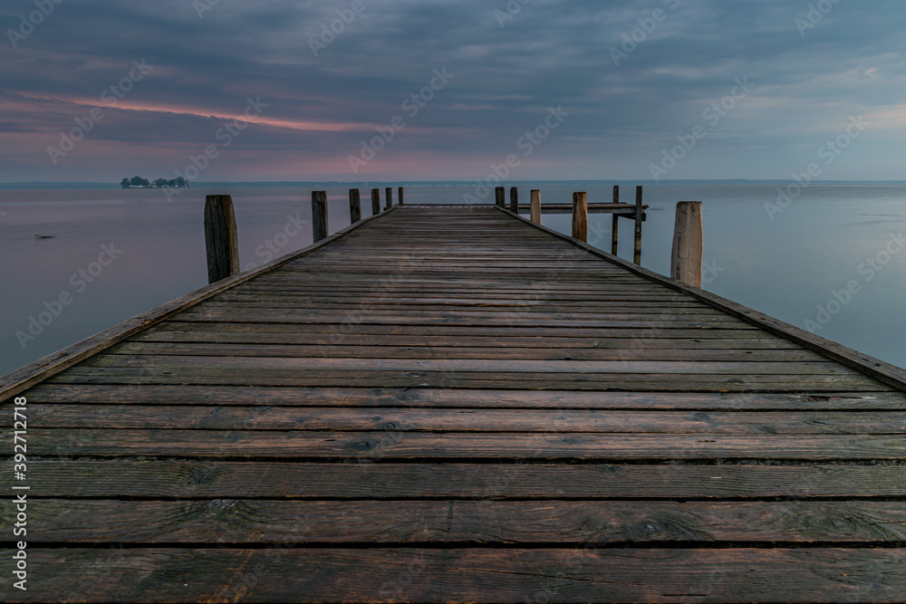 Fototapeta premium Bootssteg am Steinhuder Meer