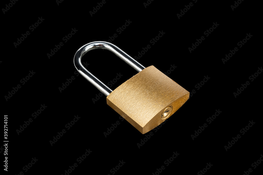 Padlock golden lock in isometric view isolated on black background. Padlock golden lock in isometric view isolated on black background.
