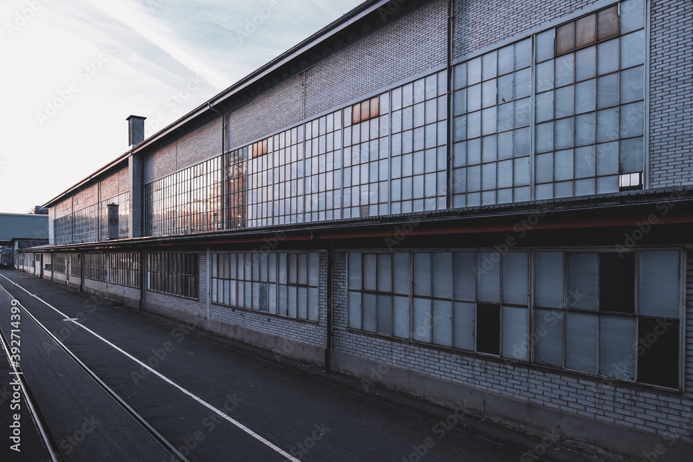 Brick building on an old abandoned industrial site from a former metal construction factory