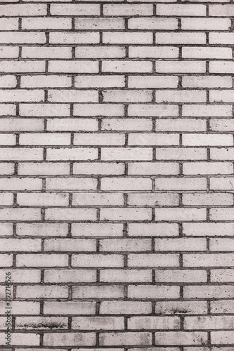 An abstract, old, beige brick wall, can be used as a background