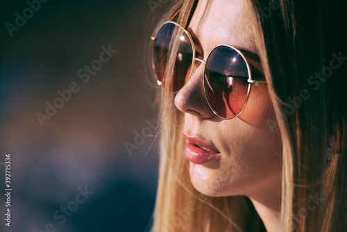Portrait of fashion woman sunny day