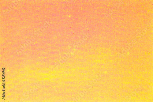 A hypersaturated canvas  orange and yellow tones. Useful texture or background. 