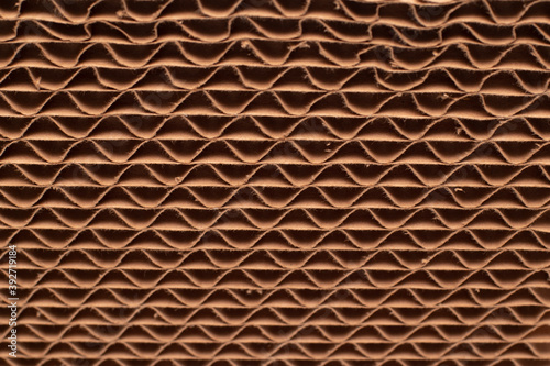 Closeup view of inner cardboard honeycomb structure of reboard material photo