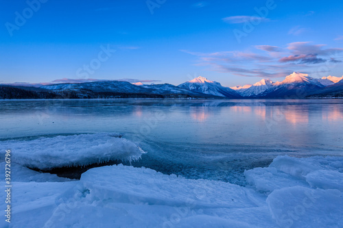 Frozen Lake At Sunset In Glacier National Park