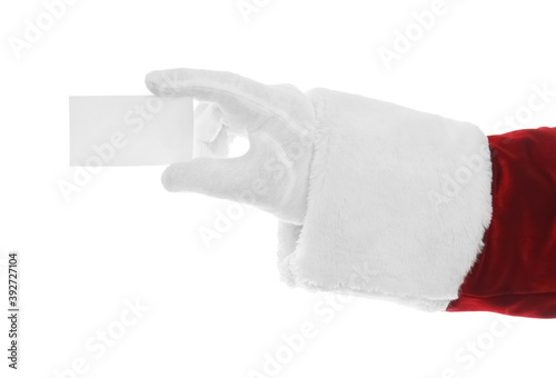 Santa Claus holding blank card on white background, closeup of hand. Space for text