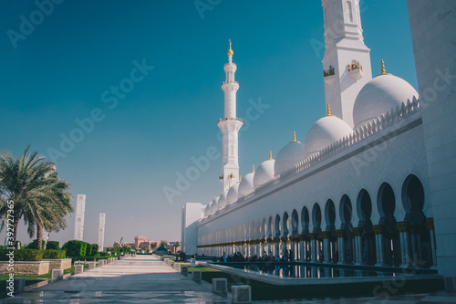 Photography Famous sheik Zayed mosque in Abu Dhabi, outside view of the biggest mosque in the world on a sunny day