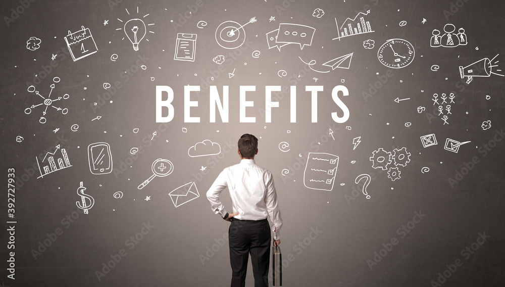 Rear view of a businessman with BENEFITS inscription, modern business concept Rear view of a businessman with BENEFITS inscription, modern business concept