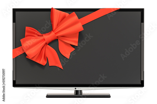 Modern TV set with ribbon and bow, gift concept. 3D rendering photo