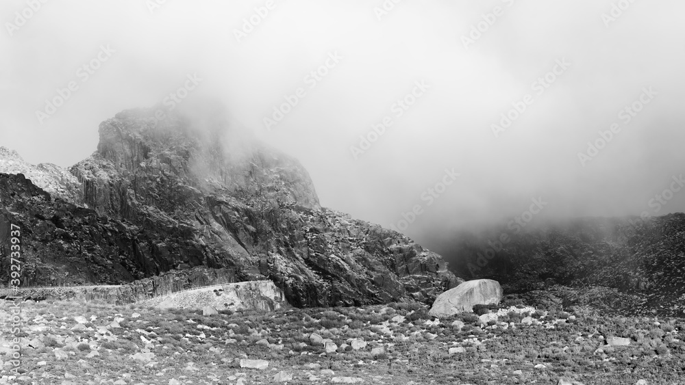 Mountain rocks with fog