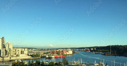 Container port at the bay with the mountain in the background