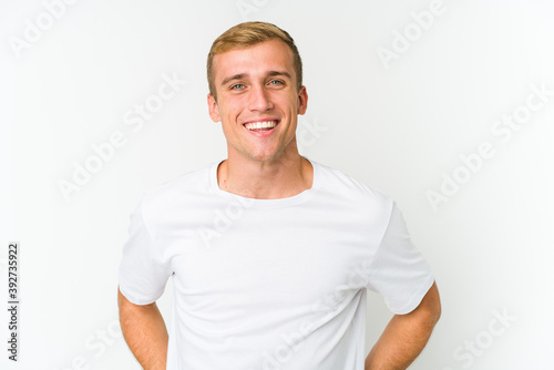 Young caucasian handsome man happy, smiling and cheerful.