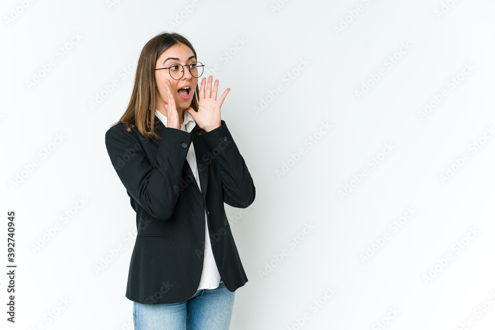 Young caucasian business woman shouts loud, keeps eyes opened and hands tense. Young caucasian business woman shouts loud, keeps eyes opened and hands tense.