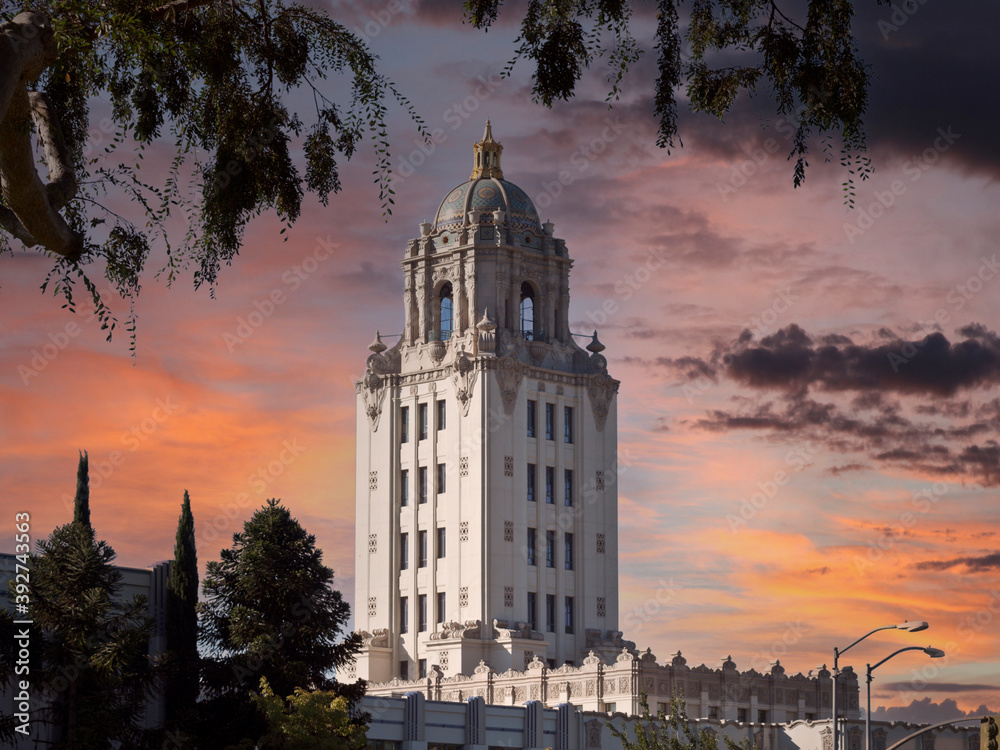 Beverly Hills City Hall building with sunset sky.