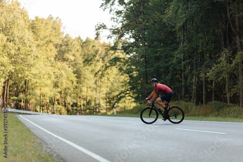 Healthy young man using bike for riding on fresh air