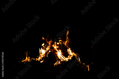 Fire flames on black background. fire burst texture for banner backdrop.