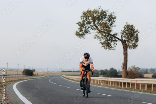 Professional road cyclist racing outdoors