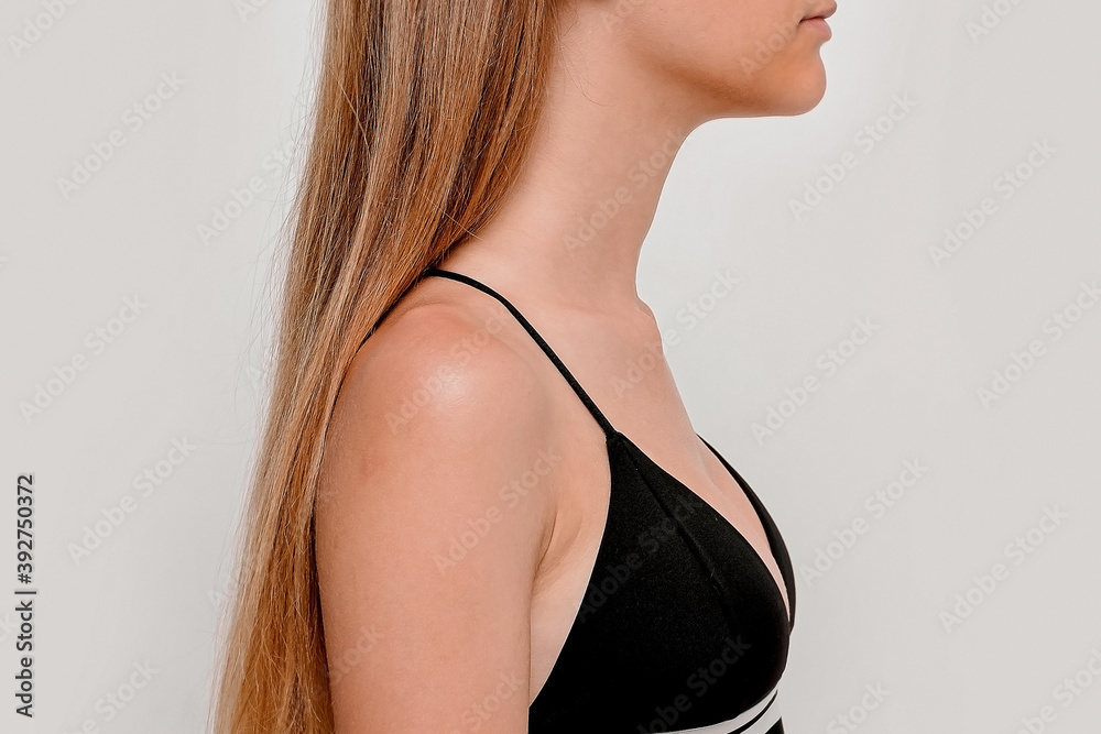 slim girl, small breasts teenage girl in black swimsuit. Stock-foto