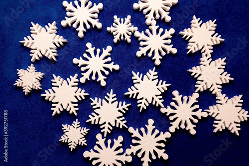 a lot of white foam snowflakes, New Year's decor for home, office, shop.
