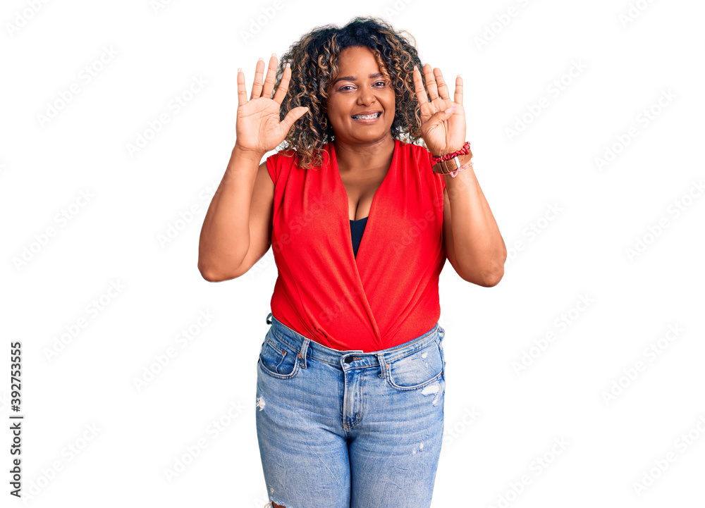 Young african american plus size woman wearing casual style with sleeveless shirt showing and pointing up with fingers number nine while smiling confident and happy. Young african american plus size woman wearing casual style with sleeveless shirt showing and pointing up with fingers number nine while smiling confident and happy.