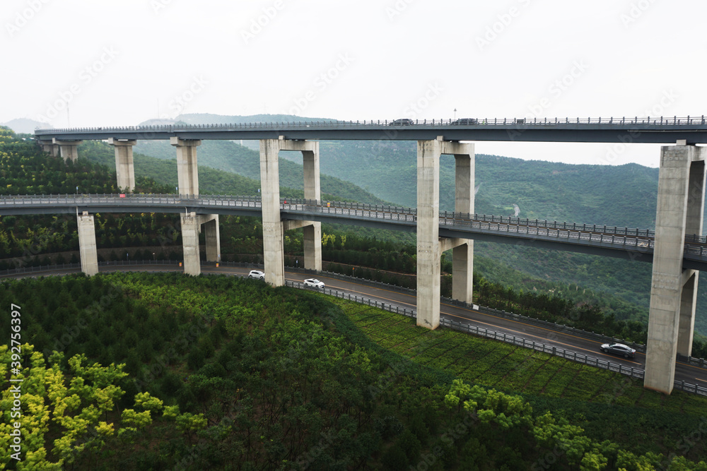 The viaduct highway is in the mountains