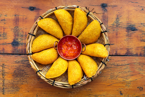 Fototapeta Naklejka Na Ścianę i Meble -  Angu pastry, with free-range chicken filling and now pro-nobs. Accompanying pepper jelly. Brazilian Mineira Food