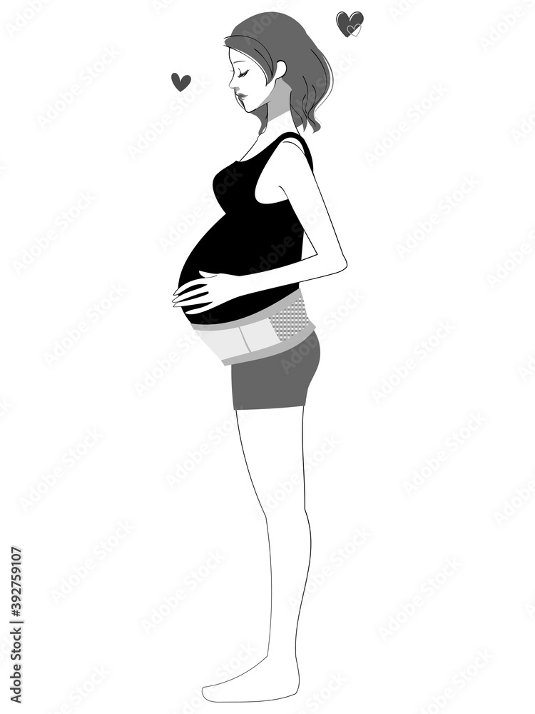 骨盤ベルトを巻いた女性 骨盤ベルトを巻いた女性