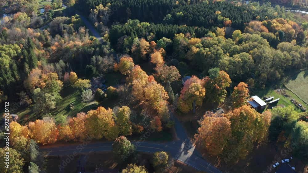 Aerial Drone Shot Flying Over Farm and Tilting Up to Reveal Fall Sunset Aerial Drone Shot Flying Over Farm and Tilting Up to Reveal Fall Sunset