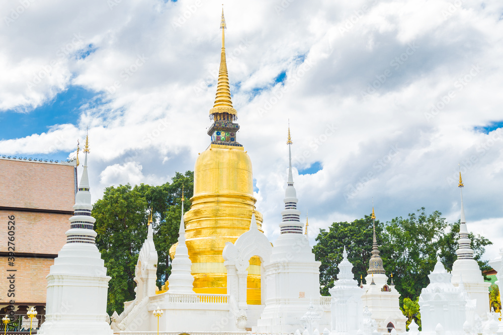 Naklejka premium Suan Dok temple, Wat Suan Dok (monastery) with blue sky, Thailand