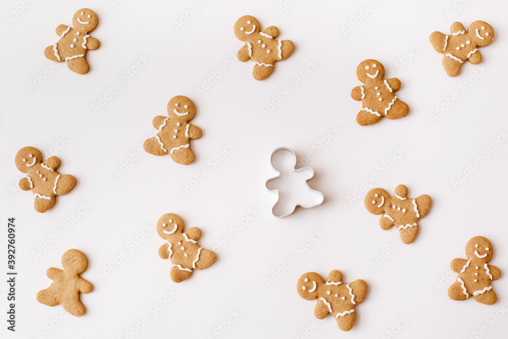Homemade gingerbread cookies on white background. Christmas, winter, new year composition. Flat lay, top view