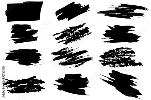 Black paint strokes in abstract style on white background. Watercolor brush texture. Stock image. EPS 10.