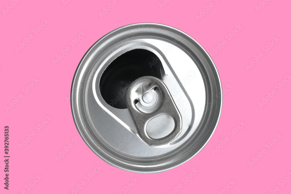 The opened cans of soft drinks are made of aluminum and have light on the shiny surface. The opened cans of soft drinks are made of aluminum and have light on the shiny surface.