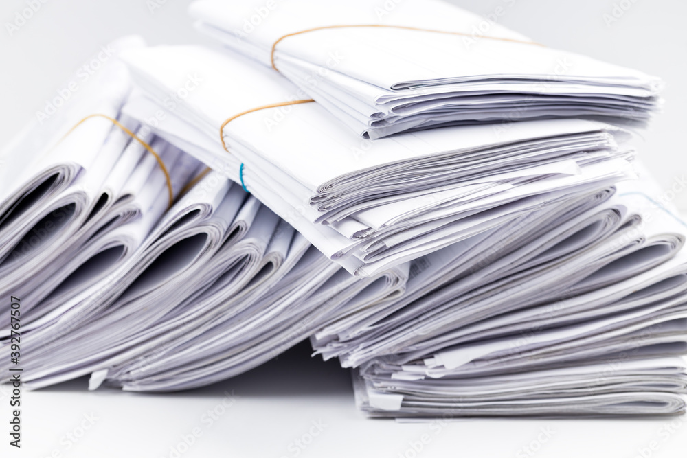 close up paper documents stack at workplace. paperwork concept. studio shot. blank close up paper documents stack at workplace. paperwork concept. studio shot. blank