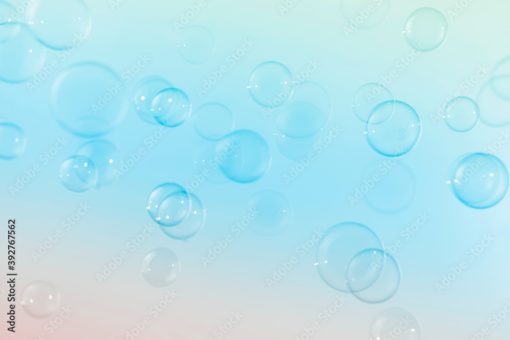 Beautiful transparent blue soap bubbles floating in the air. Abstract, Natual fresh summer holiday background.
