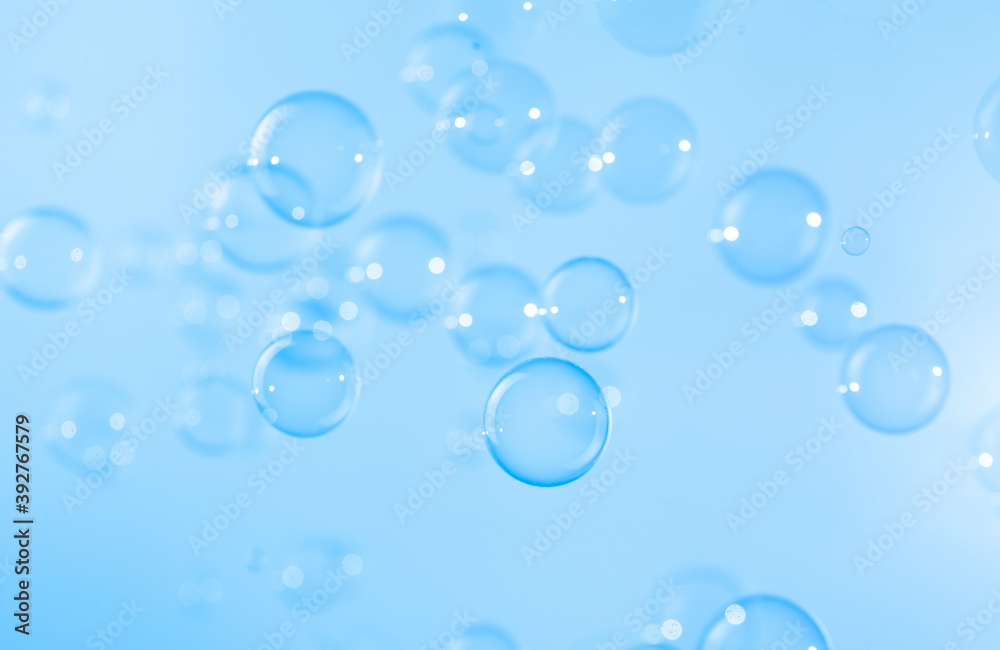 Abstract, Blue soap bubbles floating in the air. Natural freshness summer holiday background.