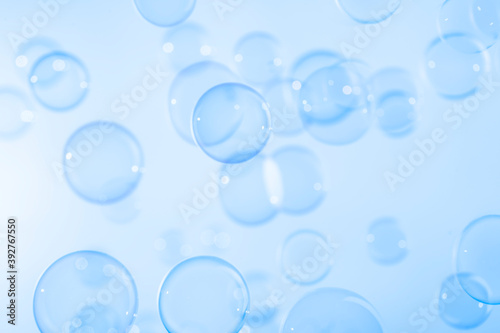 Beautiful transparent blue soap bubbles floating in the air. Abstract, Natual fresh summer holiday background.