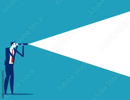 Businessman using telescope to look into the distance. Business vision concept