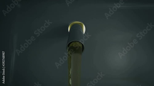 Refueling Gun insert on Gas Tank of Car and Pouring Gasoline photo