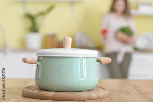 Mint green cooking pot with...