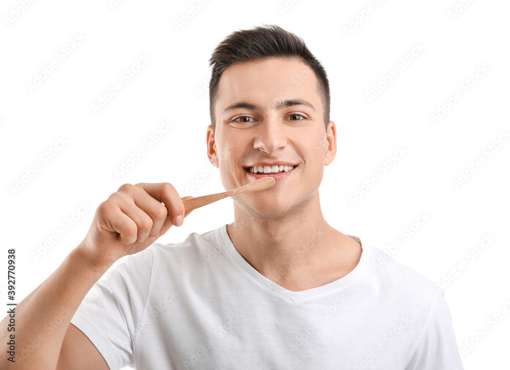 Young man with tooth brush on white background Young man with tooth brush on white background