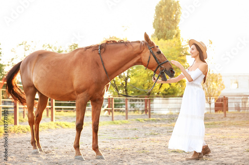 Beautiful young woman with ...