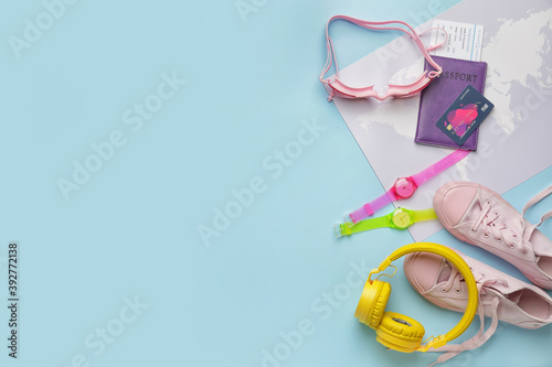 Set of travel items on colo...