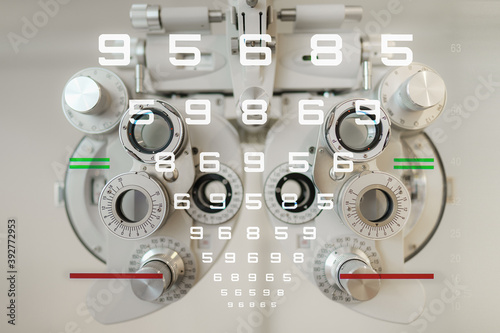 numberic eye examination chart with optometry lenses trial device