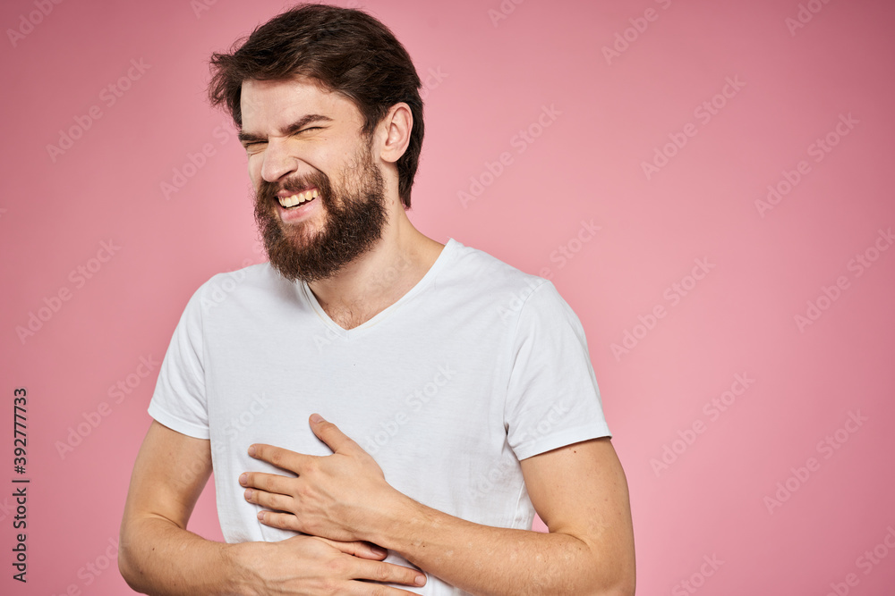 cheerful bearded man white t-shirt emotions cropped view pink background cheerful bearded man white t-shirt emotions cropped view pink background